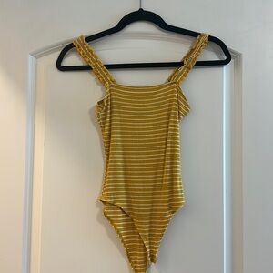 Yellow bodysuit